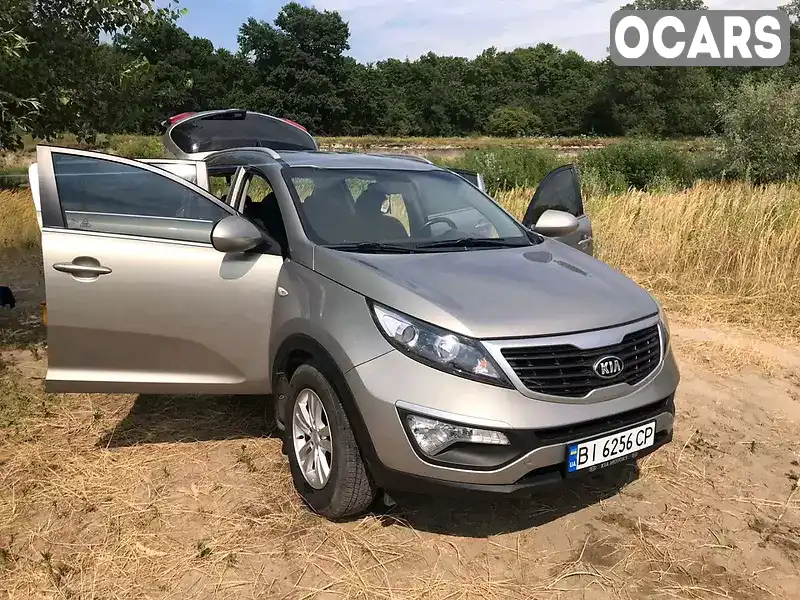 Позашляховик / Кросовер Kia Sportage 2012 1.7 л. Ручна / Механіка обл. Житомирська, Народичі - Фото 1/21