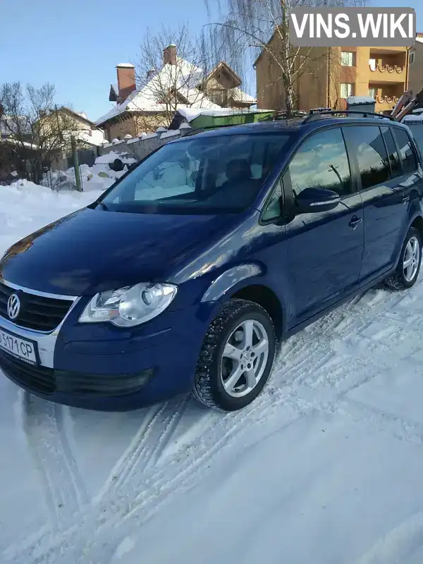 Універсал Volkswagen Touran 2009 2 л. Автомат обл. Тернопільська, Тернопіль - Фото 1/21