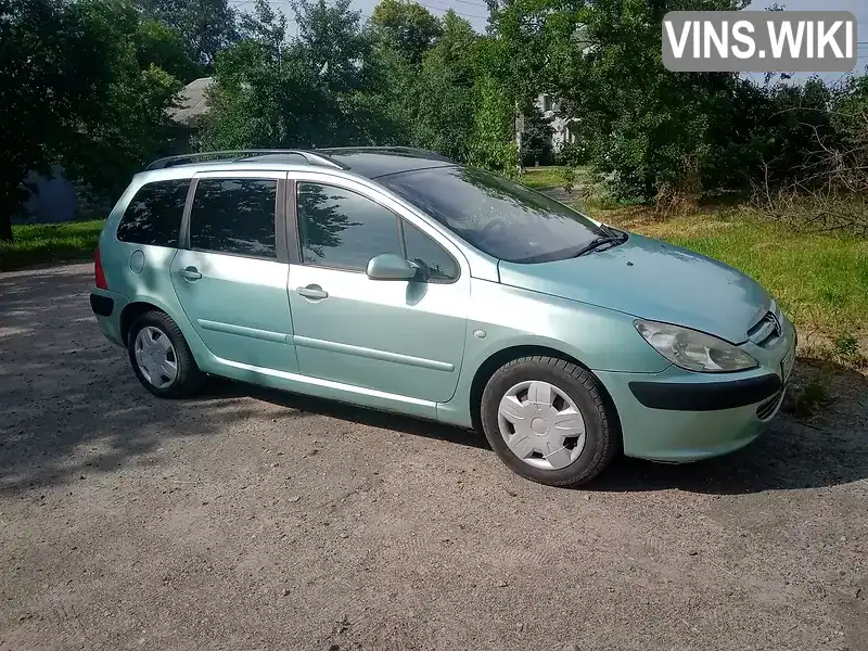 VF33HRHSB82657974 Peugeot 307 2002 Універсал 2 л. Фото 1