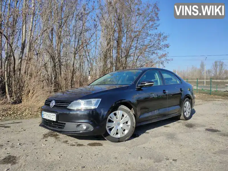 Седан Volkswagen Jetta 2011 1.2 л. Ручная / Механика обл. Хмельницкая, Изяслав - Фото 1/12