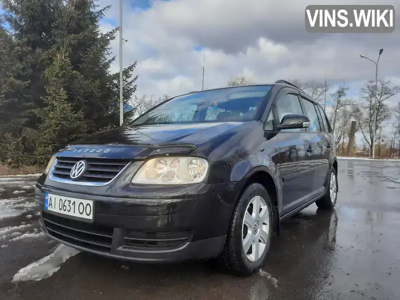 Минивэн Volkswagen Touran 2006 1.4 л. Ручная / Механика обл. Житомирская, Бердичев - Фото 1/21