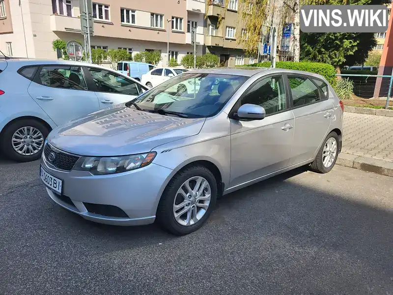 Хетчбек Kia Cerato 2012 1.98 л. Автомат обл. Київська, Вишневе - Фото 1/21