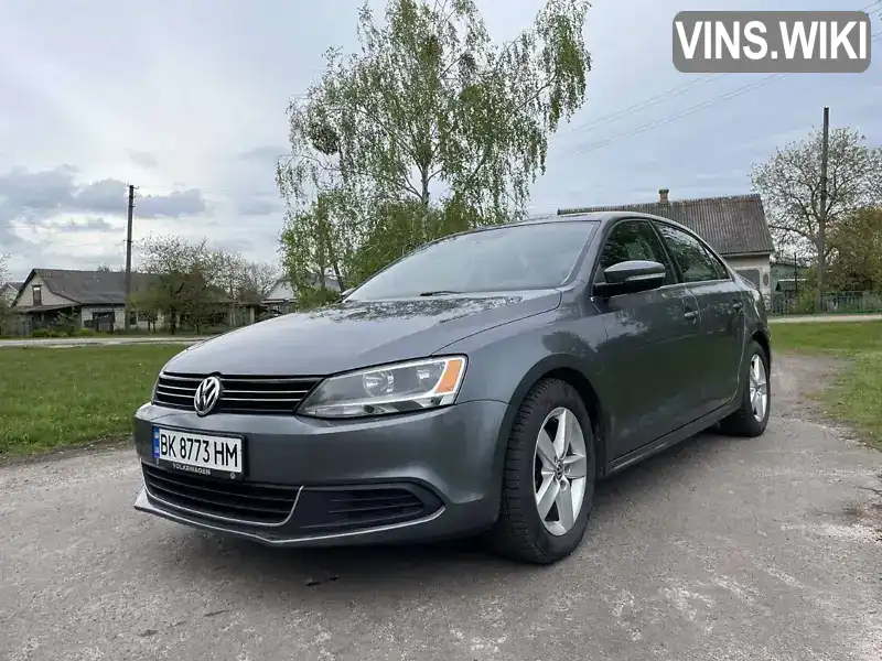 Седан Volkswagen Jetta 2013 2 л. Автомат обл. Рівненська, Сарни - Фото 1/21