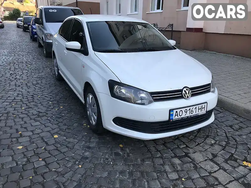 Седан Volkswagen Polo 2014 1.6 л. Ручная / Механика обл. Закарпатская, Мукачево - Фото 1/21