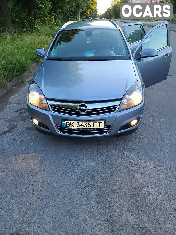 W0L0AHL35A2078708 Opel Astra 2010 Универсал 1.7 л. Фото 1