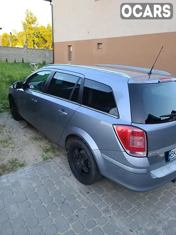 W0L0AHL35A2078708 Opel Astra 2010 Универсал 1.7 л. Фото 4