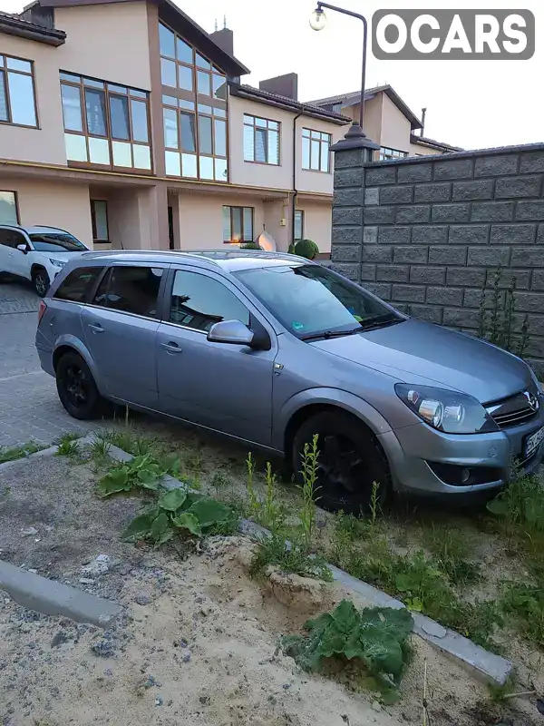 W0L0AHL35A2078708 Opel Astra 2010 Универсал 1.7 л. Фото 9