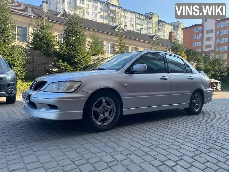 Седан Mitsubishi Lancer 2002 2 л. Ручная / Механика обл. Ивано-Франковская, Ивано-Франковск - Фото 1/14