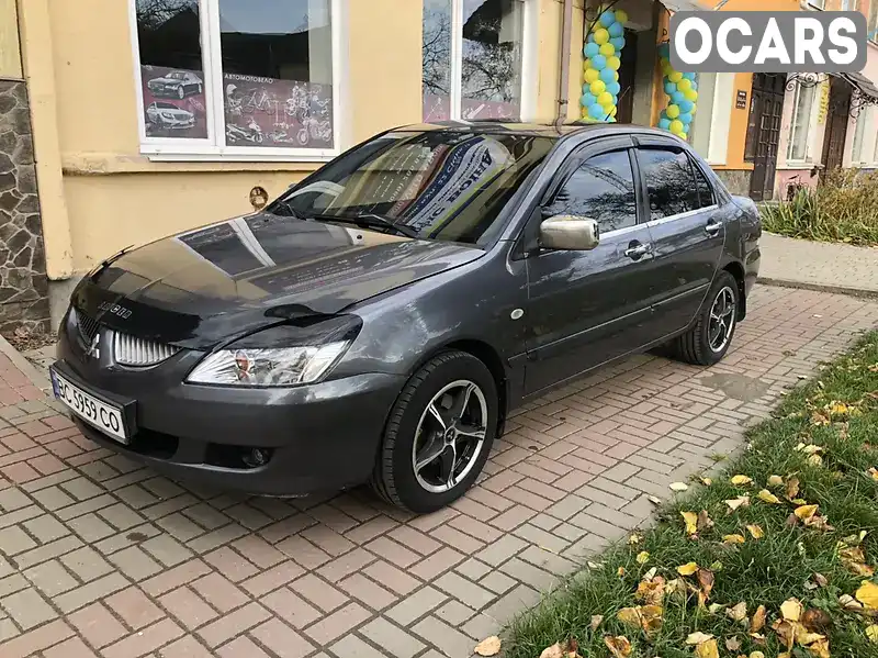 Седан Mitsubishi Lancer 2008 1.6 л. Ручна / Механіка обл. Львівська, Броди - Фото 1/21