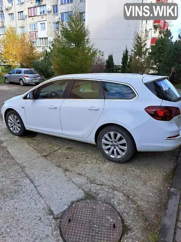 W0LPE8E38F8019227 Opel Astra 2014 Универсал 1.6 л. Фото 2