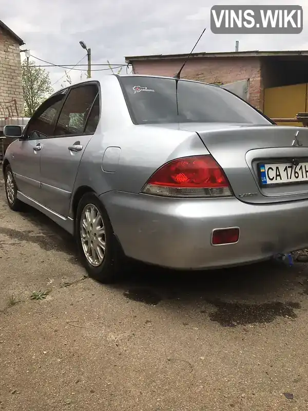 Седан Mitsubishi Lancer 2005 1.6 л. Ручная / Механика обл. Черкасская, Жашков - Фото 1/4