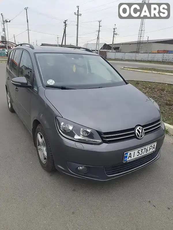 Микровэн Volkswagen Touran 2013 1.6 л. Ручная / Механика обл. Киевская, Буча - Фото 1/21