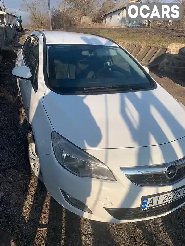 W0LPD8EK5C8112793 Opel Astra 2012 Универсал 1.7 л. Фото 1