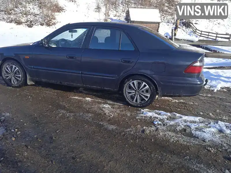 JMZGF12F201126934 Mazda 626 1997 Седан 2 л. Фото 8