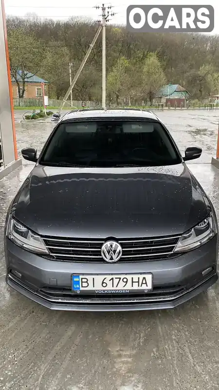 Седан Volkswagen Jetta 2015 1.8 л. Автомат обл. Полтавська, Полтава - Фото 1/21