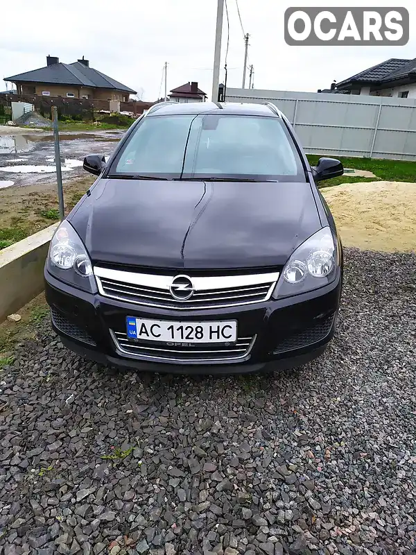 W0L0AHL35A2054287 Opel Astra 2010 Универсал 1.7 л. Фото 1