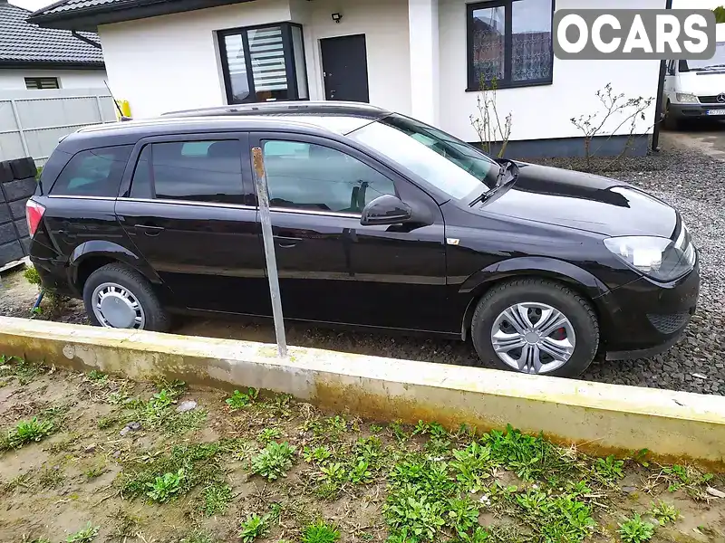 W0L0AHL35A2054287 Opel Astra 2010 Универсал 1.7 л. Фото 4