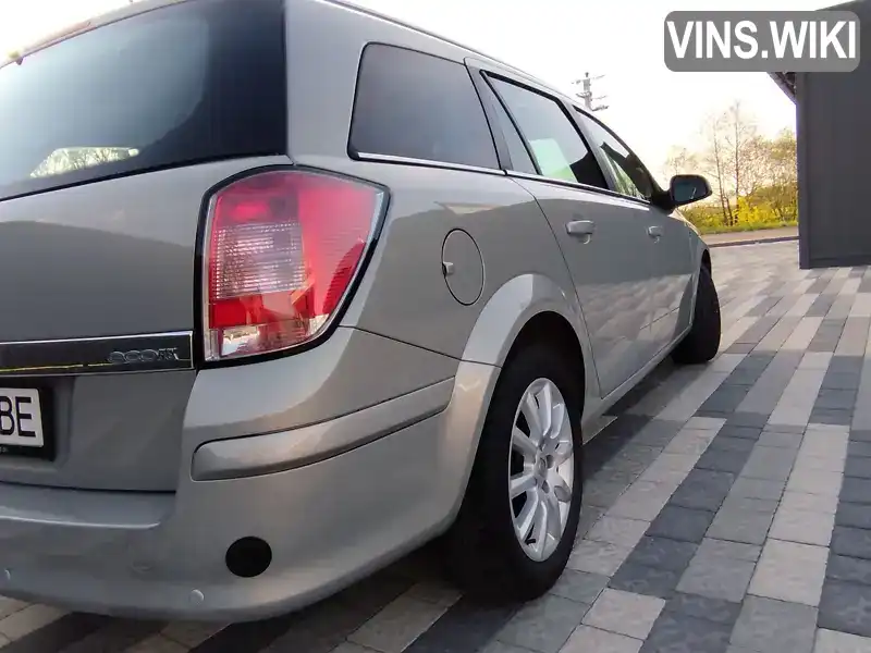 W0L0AHL35A2070601 Opel Astra 2010 Универсал 1.4 л. Фото 8