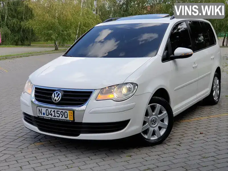 Минивэн Volkswagen Touran 2010 1.9 л. Автомат обл. Ивано-Франковская, Калуш - Фото 1/21