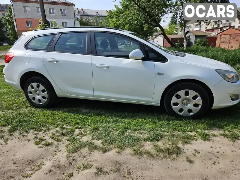 W0LPD8EA0B8091938 Opel Astra 2011 Универсал 1.3 л. Фото 2