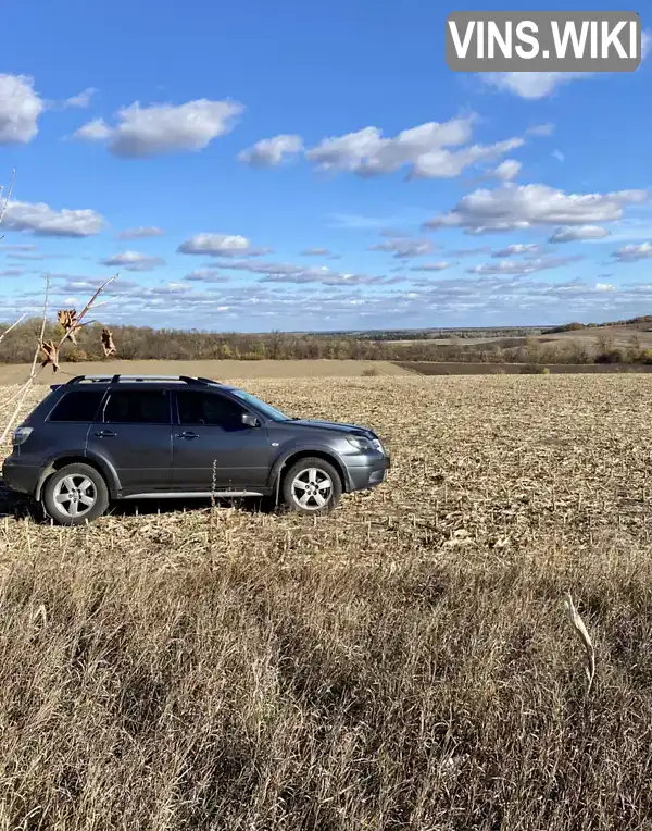 Внедорожник / Кроссовер Mitsubishi Outlander 2007 2.4 л. Автомат обл. Полтавская, Кобеляки - Фото 1/14