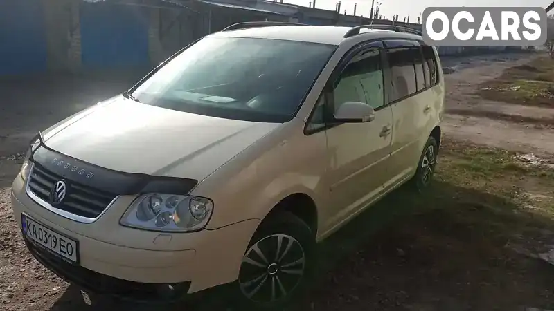 Мінівен Volkswagen Touran 2006 1.9 л. Ручна / Механіка обл. Дніпропетровська, Вільногірськ - Фото 1/21