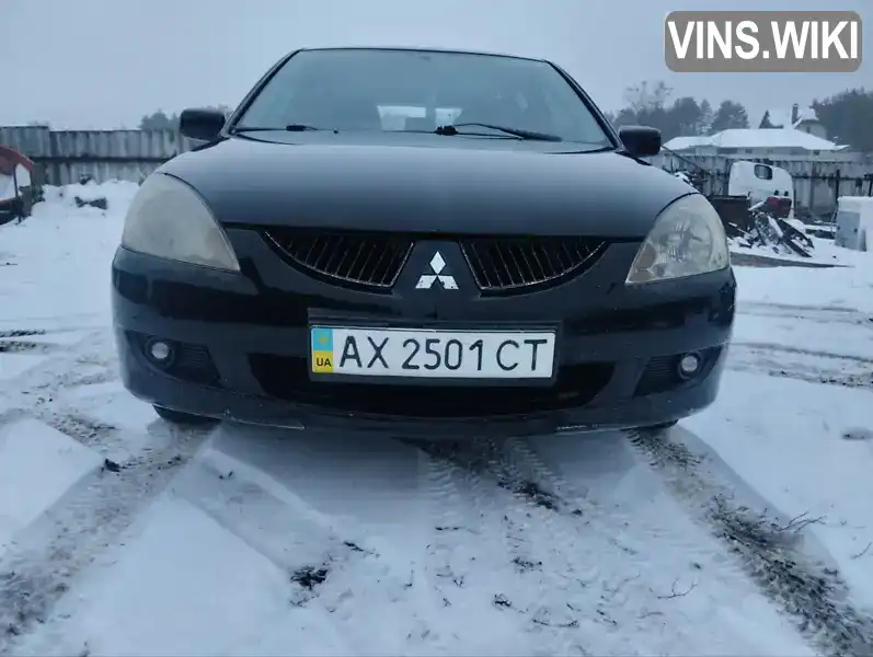 Универсал Mitsubishi Lancer 2004 1.6 л. Ручная / Механика обл. Харьковская, Змиев - Фото 1/6