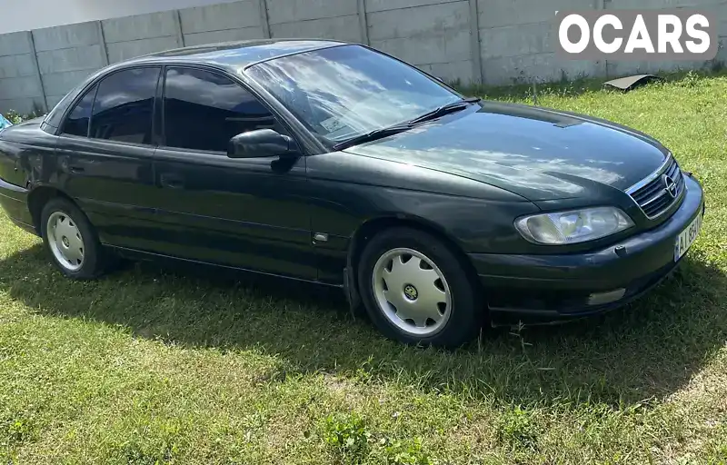 Седан Opel Omega 2002 null_content л. Ручна / Механіка обл. Київська, Вишневе - Фото 1/9