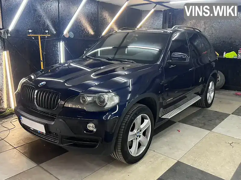 Позашляховик / Кросовер BMW X5 2009 3 л. Автомат обл. Київська, Вишневе - Фото 1/12