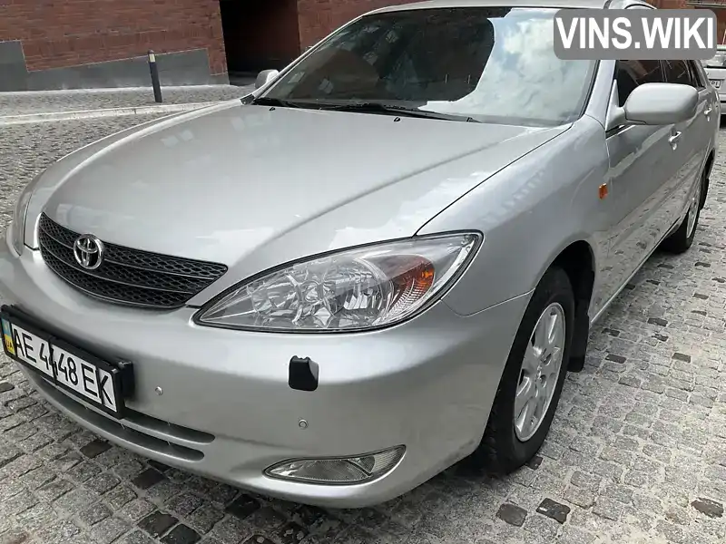 Седан Toyota Camry 2004 2.4 л. Автомат обл. Дніпропетровська, Дніпро (Дніпропетровськ) - Фото 1/21