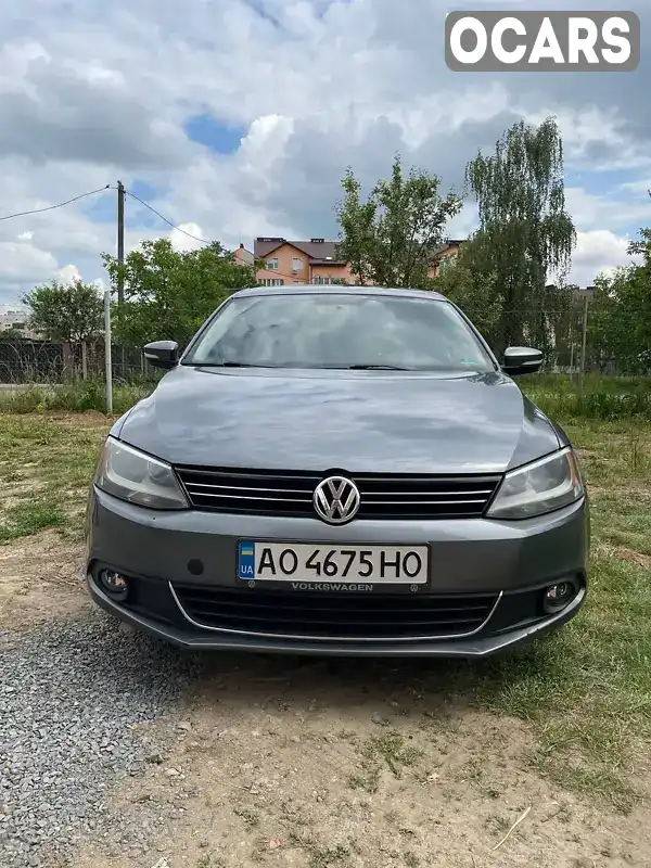 Седан Volkswagen Jetta 2013 1.8 л. Автомат обл. Закарпатська, Мукачево - Фото 1/21