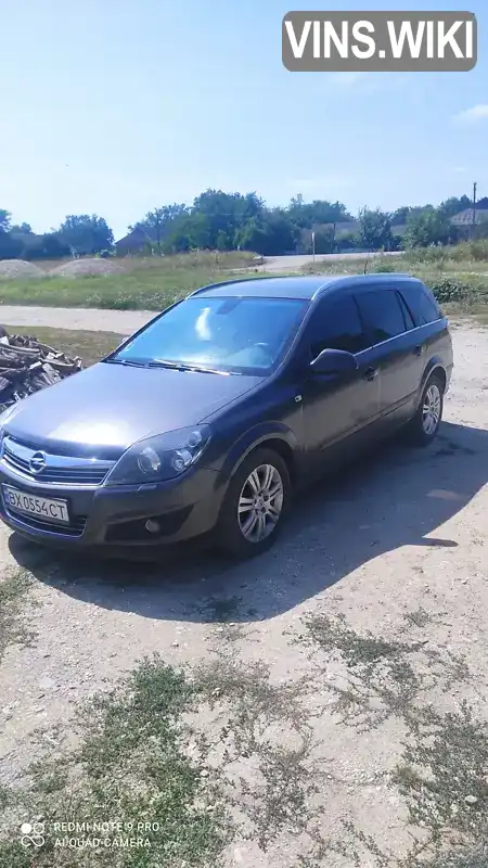 W0L0AHL35A5060878 Opel Astra 2010 Универсал 1.69 л. Фото 5