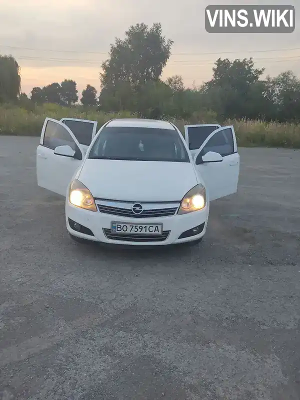 W0L0AHL35C2018798 Opel Astra 2011 Универсал 1.69 л. Фото 1