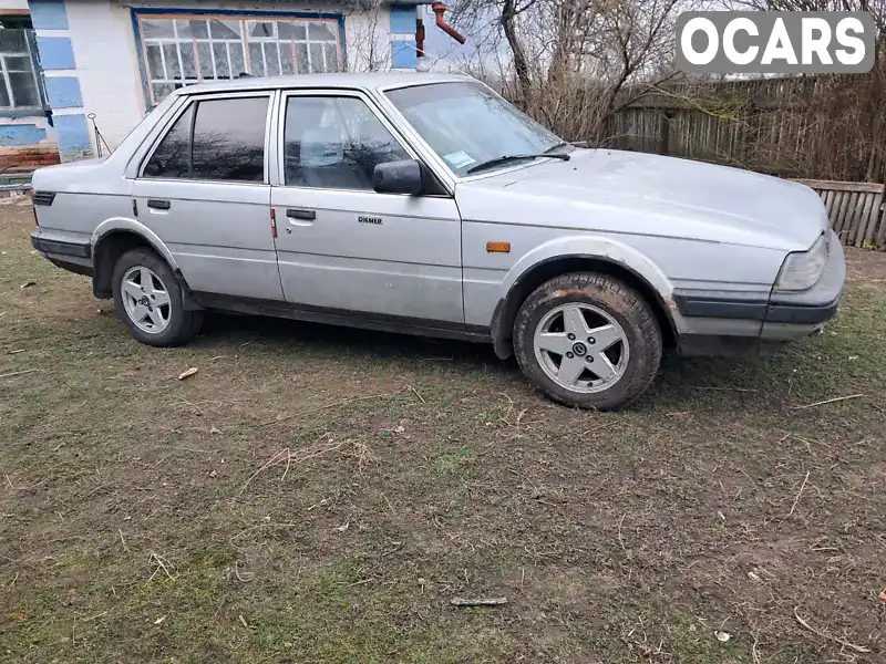 JMZGC123201655339 Mazda 626 1985 Седан 2 л. Фото 1