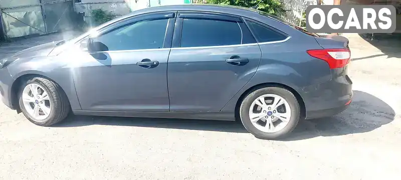 Седан Ford Focus 2013 1 л. Ручна / Механіка обл. Дніпропетровська, Кам'янське (Дніпродзержинськ) - Фото 1/9