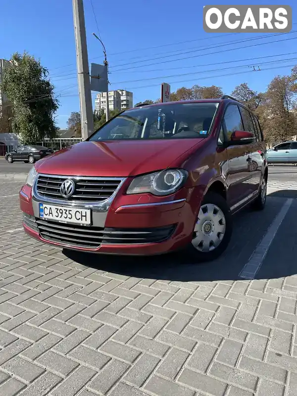 Минивэн Volkswagen Touran 2010 1.9 л. Ручная / Механика обл. Черкасская, Черкассы - Фото 1/21