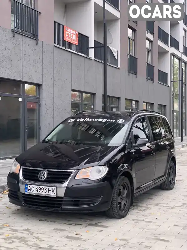 Мінівен Volkswagen Touran 2007 1.4 л. Ручна / Механіка обл. Закарпатська, Ужгород - Фото 1/15