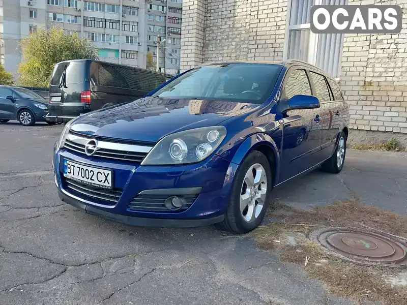 W0L0AHL3562025957 Opel Astra 2006 Универсал 1.9 л. Фото 2