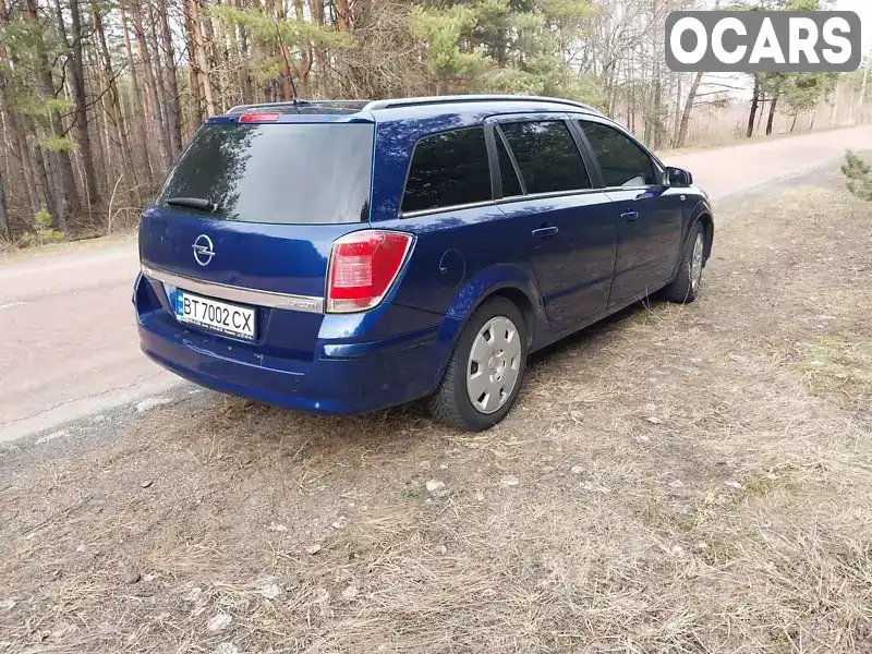 W0L0AHL3562025957 Opel Astra 2006 Универсал 1.9 л. Фото 7