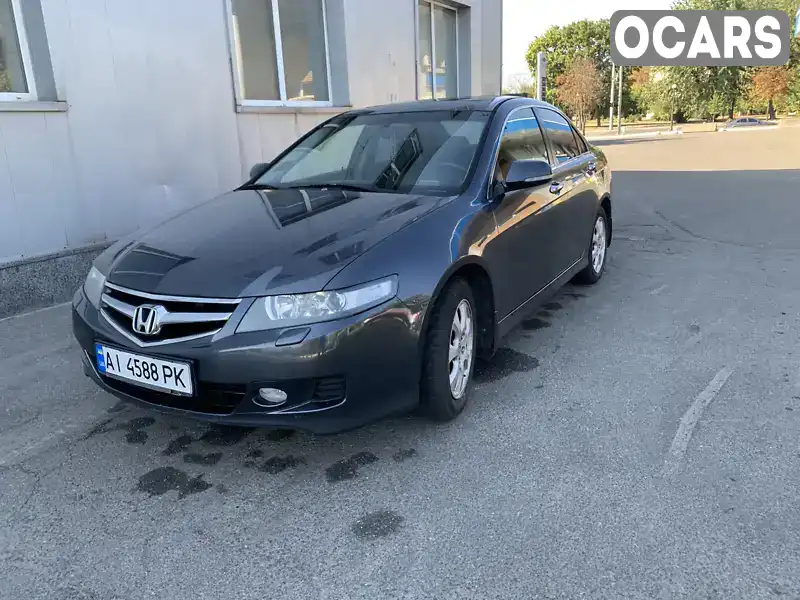 Седан Honda Accord 2006 2 л. Ручная / Механика обл. Киевская, Вышневое - Фото 1/15