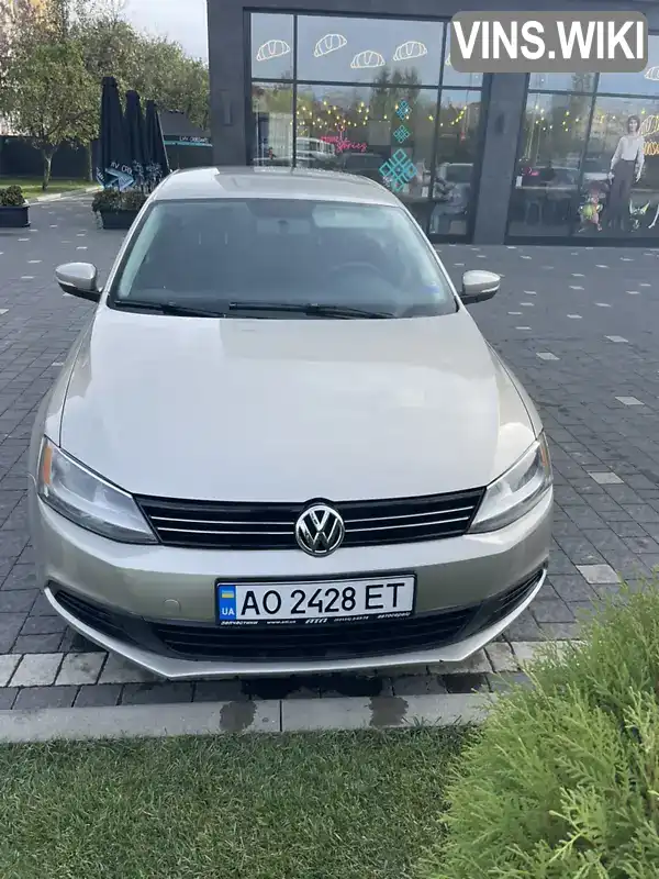 Седан Volkswagen Jetta 2014 1.8 л. Автомат обл. Закарпатська, Ужгород - Фото 1/17