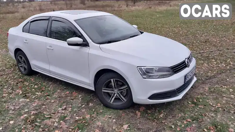 Седан Volkswagen Jetta 2014 1.8 л. Автомат обл. Хмельницкая, Летичев - Фото 1/11