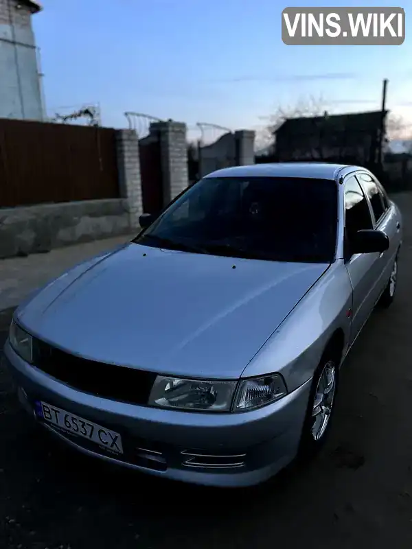 Седан Mitsubishi Lancer 2000 1.3 л. Ручная / Механика обл. Херсонская, Херсон - Фото 1/14