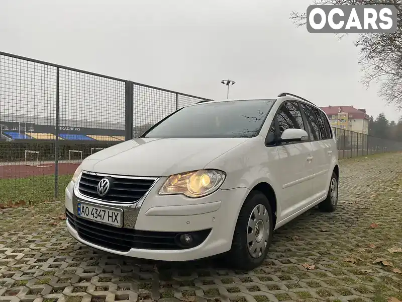 Мінівен Volkswagen Touran 2007 1.4 л. Ручна / Механіка обл. Закарпатська, Мукачево - Фото 1/21