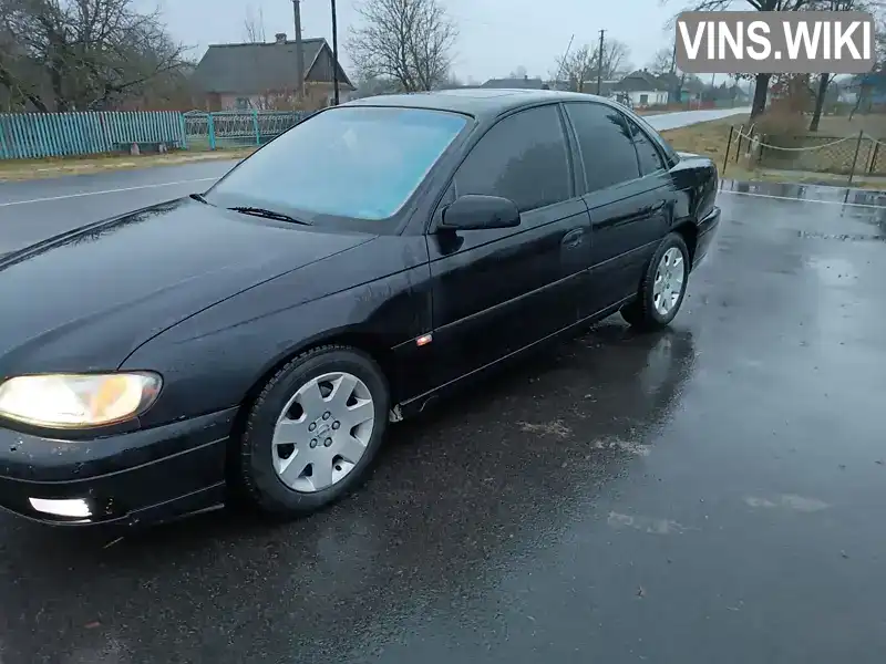 W0L0VBP69Y1071617 Opel Omega 2000 Седан 2.96 л. Фото 3