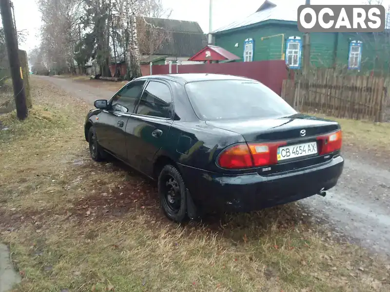 Седан Mazda 323 1996 1.5 л. Ручна / Механіка обл. Чернігівська, Чернігів - Фото 1/7