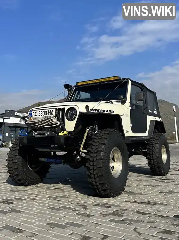 Позашляховик / Кросовер Jeep Wrangler 1998 4 л. Ручна / Механіка обл. Закарпатська, Ужгород - Фото 1/21