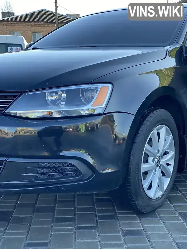 Седан Volkswagen Jetta 2012 2 л. Автомат обл. Дніпропетровська, Кривий Ріг - Фото 1/21