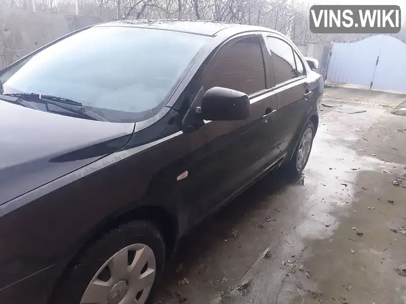 Седан Mitsubishi Lancer 2010 1.5 л. Автомат обл. Черкаська, Чорнобай - Фото 1/12