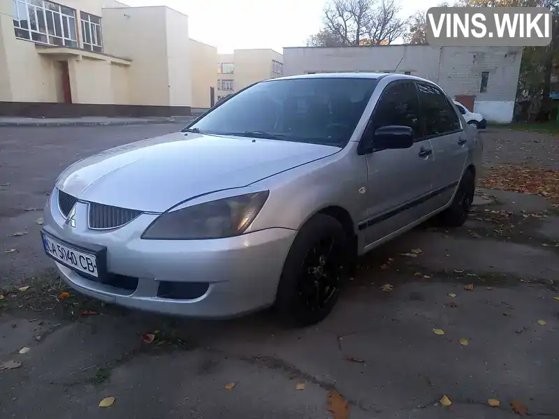 Седан Mitsubishi Lancer 2003 1.6 л. Ручная / Механика обл. Черкасская, Черкассы - Фото 1/21